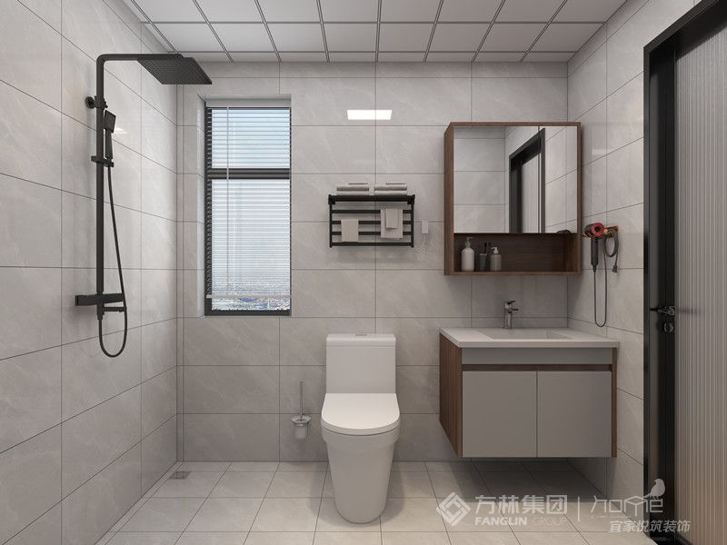 卫生间用了灰色的砖来搭配深灰色的洗手台，让整体空间更加统一，同时考虑了干湿分区，增加了壁龛收纳。